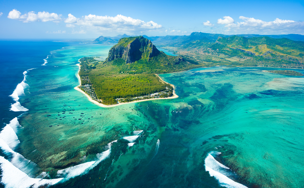 White sand beach and palm trees in Mauritius.